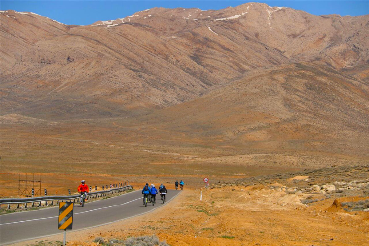 Biking through Iran landscapes on Iran classic route bicycle tour!