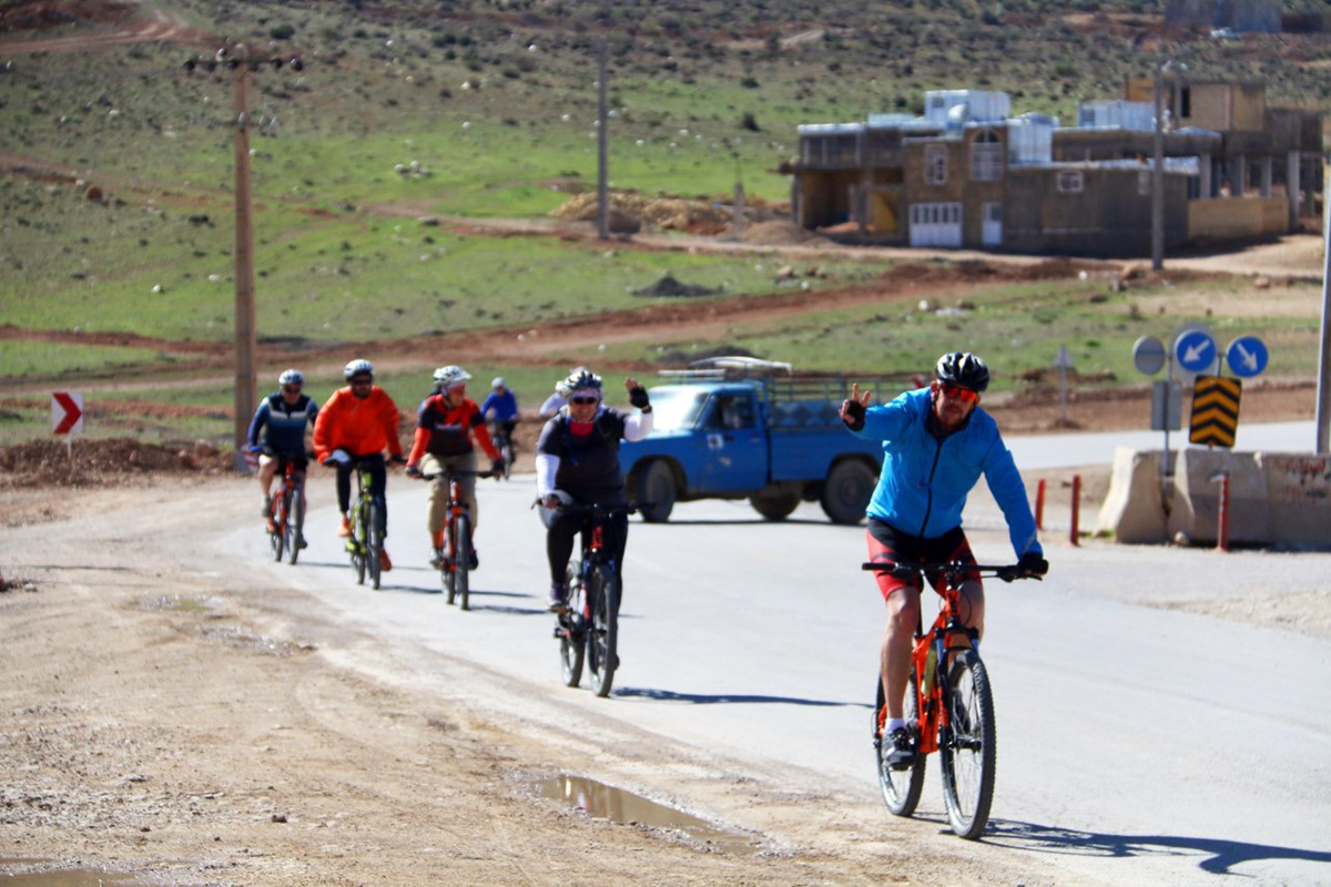 Cycling through Iran landscapes on north of Iran bike tour!